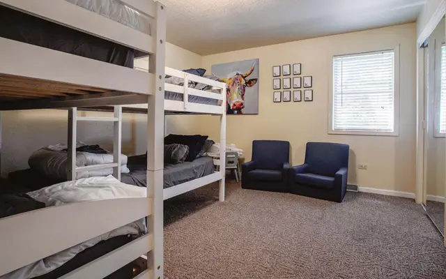 Bunk room with two twin-over-twin bunks